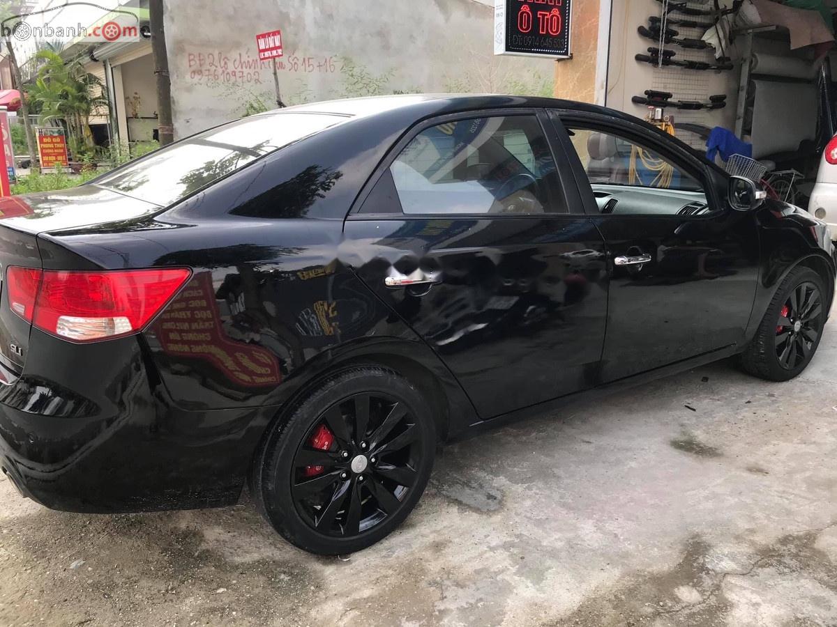 Kia Forte SLi 2009 - Bán Kia Forte SLi sản xuất năm 2009, màu đen, nhập khẩu số tự động