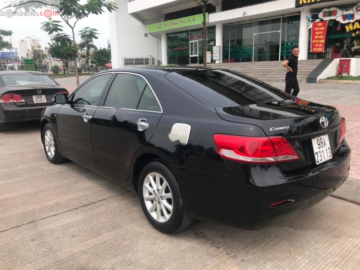 Toyota Camry 2.4G 2012 - Chính chủ bán Toyota Camry bản 2.4G đời 2012, màu đen, giá 660tr