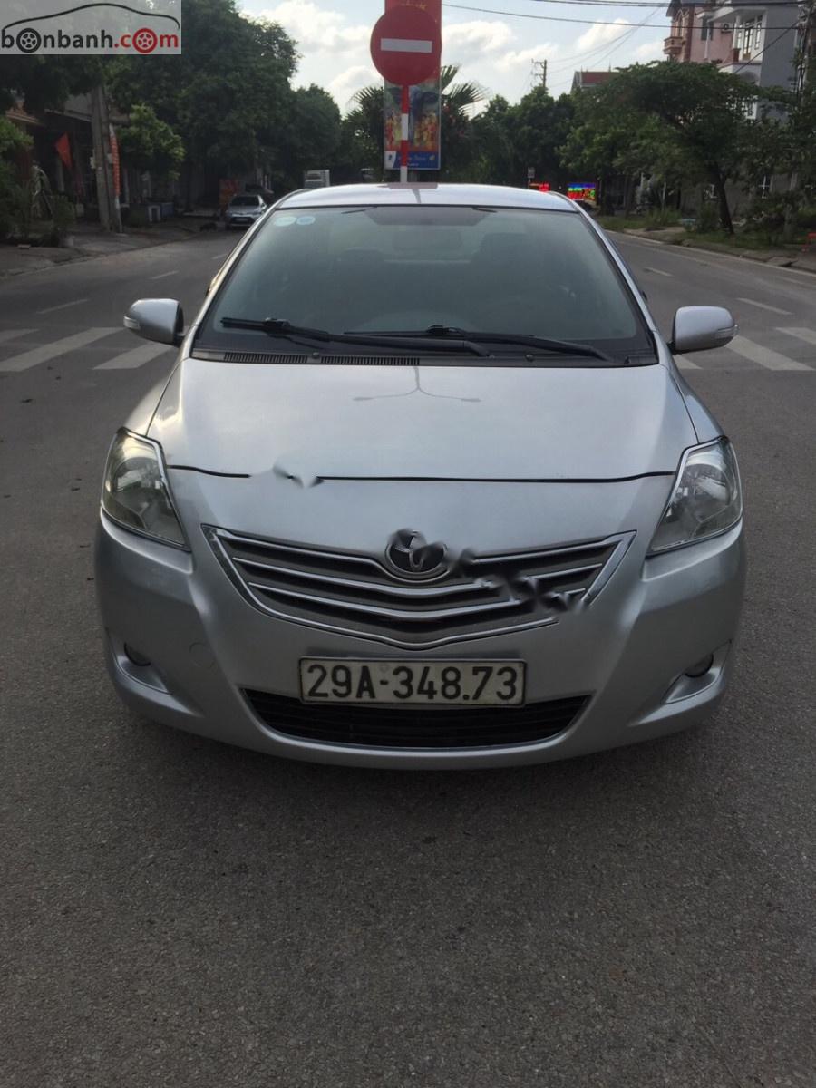 Toyota Vios 1.5E 2011 - Gia đình bán Toyota Vios 1.5E năm 2011, màu bạc 