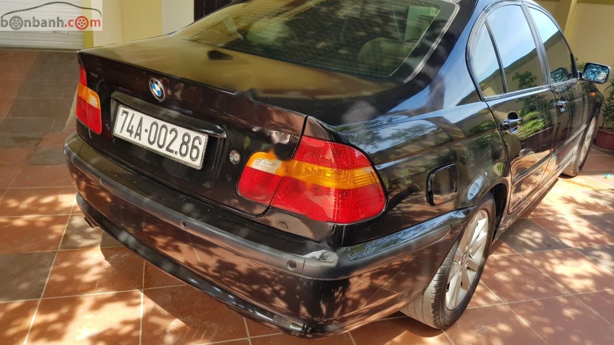 BMW 3 Series 318i 2003 - Bán BMW 318i đời 2003, màu đen, số tự động 