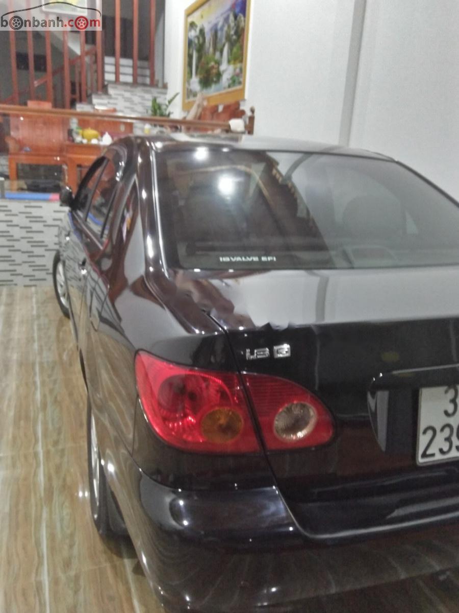 Toyota Corolla altis 1.8G MT 2003 - Cần bán Toyota Corolla altis 1.8G MT đời 2003, màu đen  