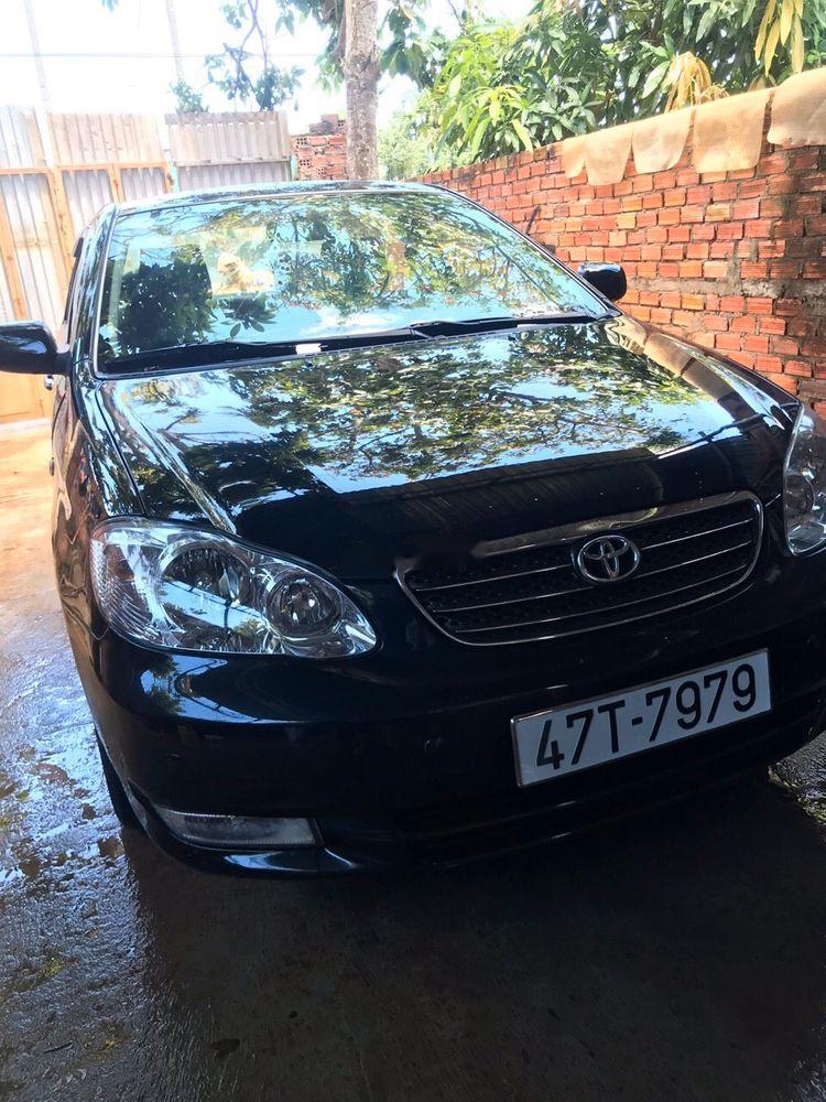 Toyota Corolla altis   2004 - Chính chủ bán Toyota Corolla altis đời 2004, màu đen, xe nhập