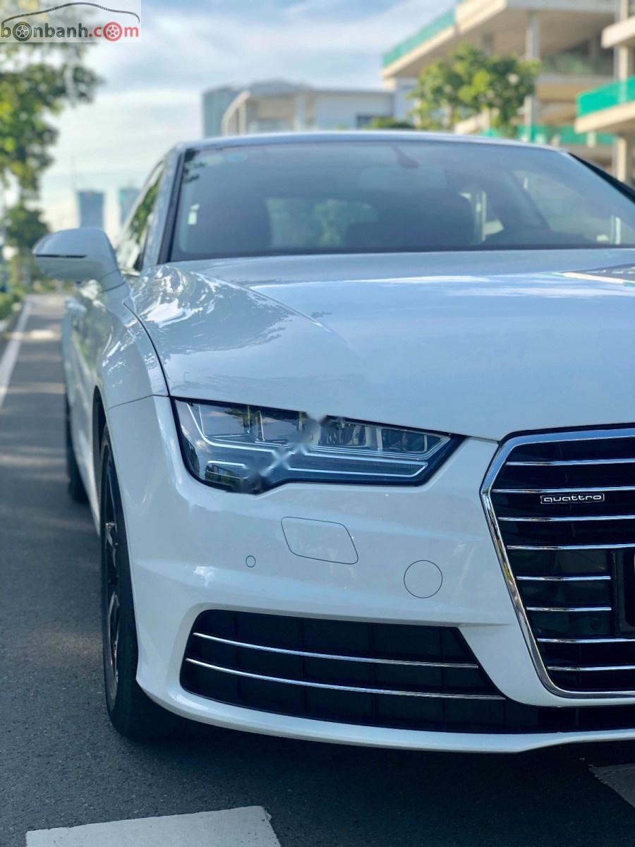 Audi A7 2014 - Chính chủ bán xe Audi A7 SX 2014, màu trắng, xe nhập