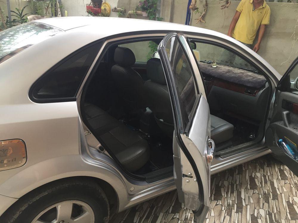 Daewoo Lacetti   2011 - Bán xe Daewoo Lacetti đời 2011, màu bạc, 4.5lít/100 km