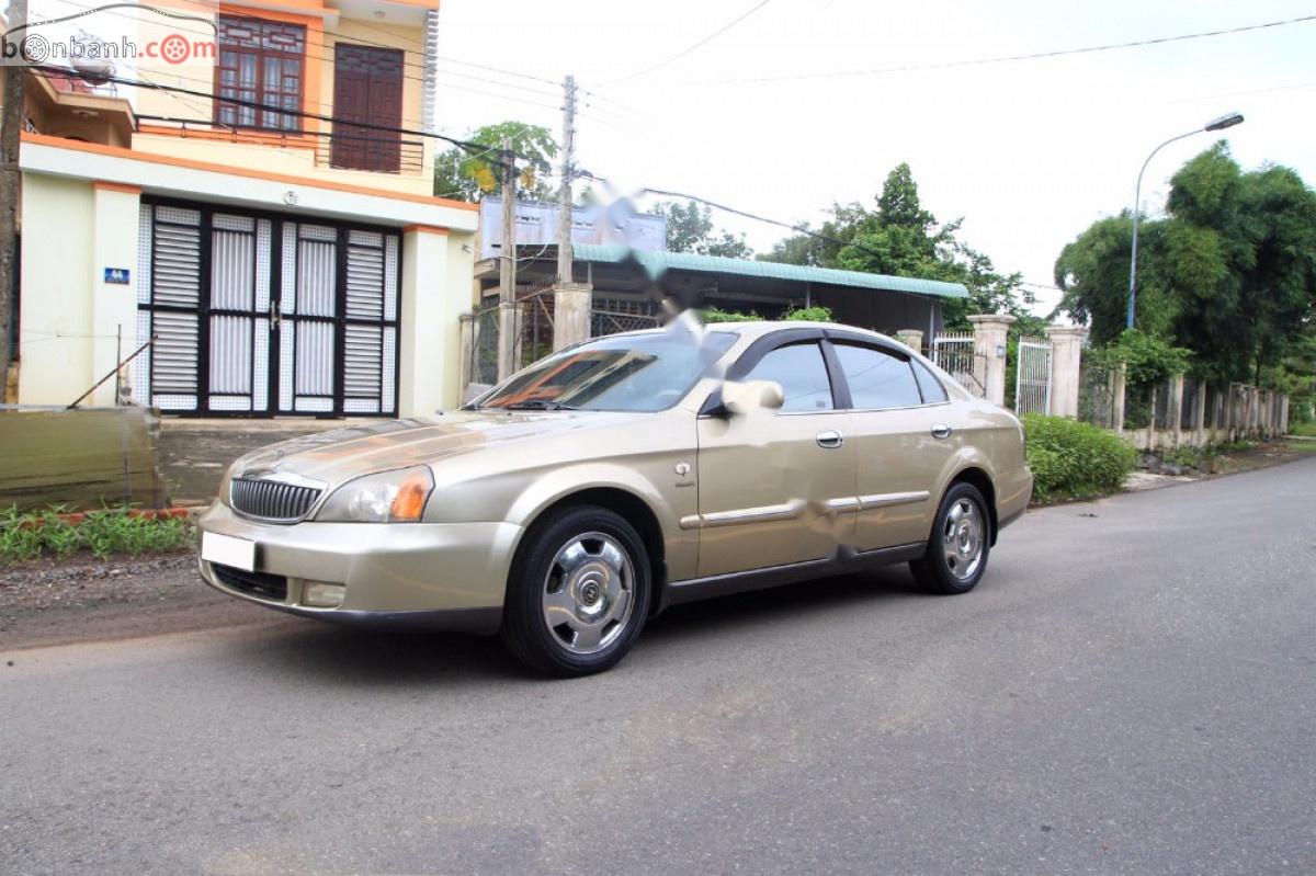 Daewoo Magnus AT 2005 - Bán Daewoo Magnus AT năm 2005, màu vàng số tự động, 148 triệu