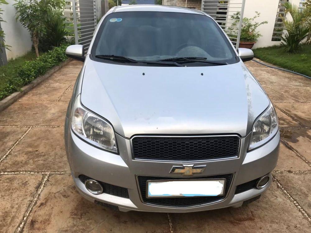 Chevrolet Aveo   LT   2015 - Bán Chevrolet Aveo LT năm sản xuất 2015, màu bạc