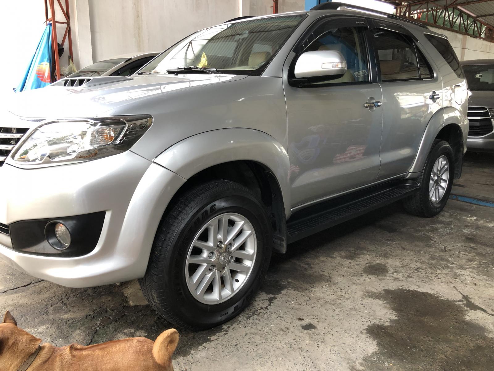 Toyota Fortuner G 2014 - Bán Toyota Fortuner G sản xuất năm 2014, màu bạc, gia đình sử dụng kỹ