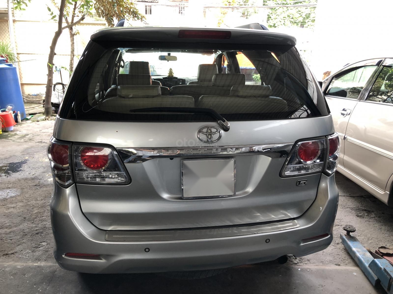 Toyota Fortuner G 2014 - Bán Toyota Fortuner G sản xuất năm 2014, màu bạc, gia đình sử dụng kỹ