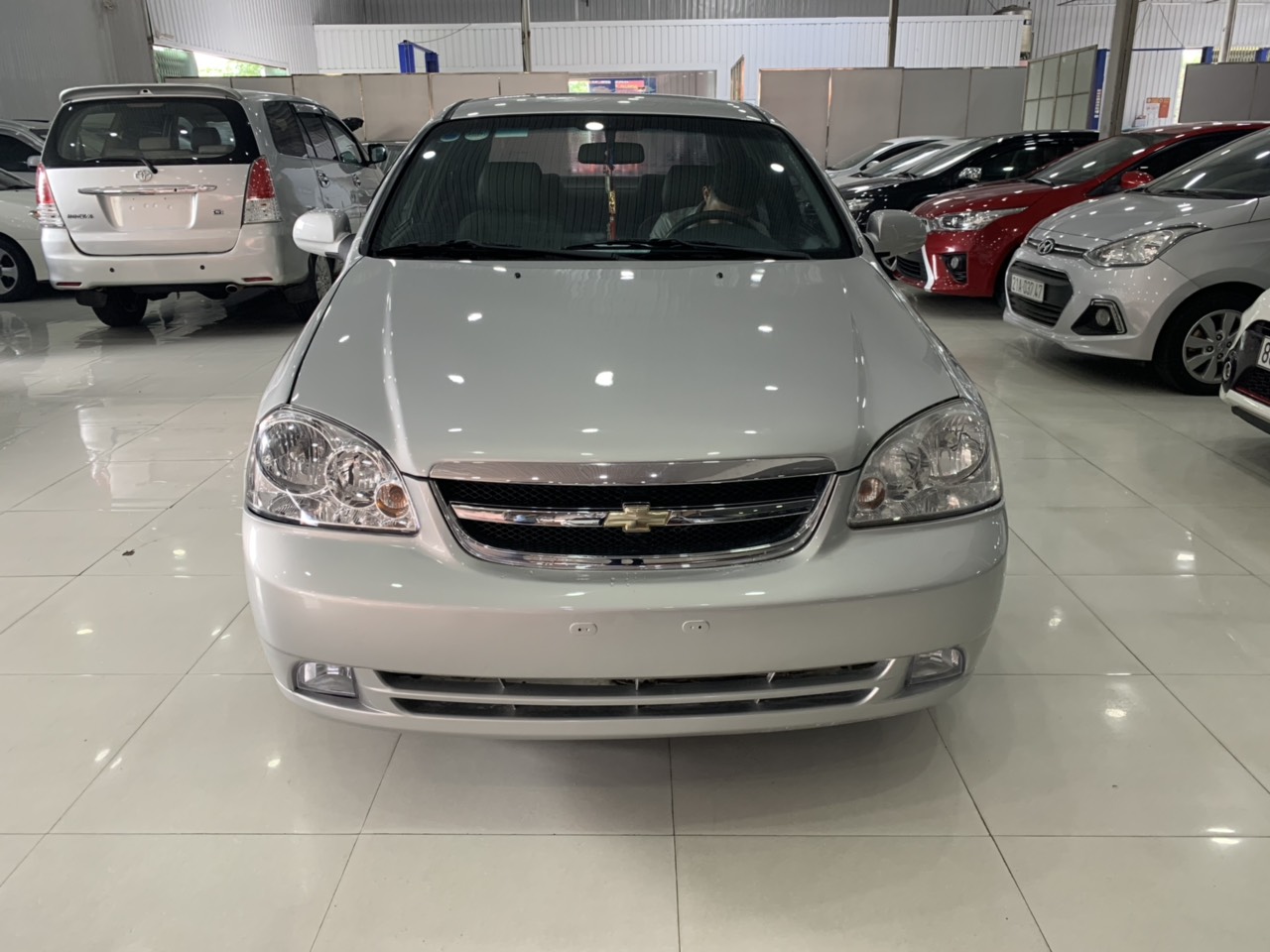 Daewoo Lacetti 1.6MT 2013 - Bán Daewoo Lacetti 1.6MT sản xuất 2013, màu bạc