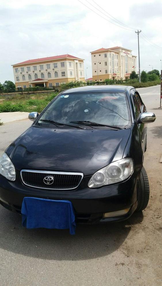 Toyota Corolla altis   2003 - Cần bán lại xe Toyota Corolla altis năm sản xuất 2003, màu đen, máy êm