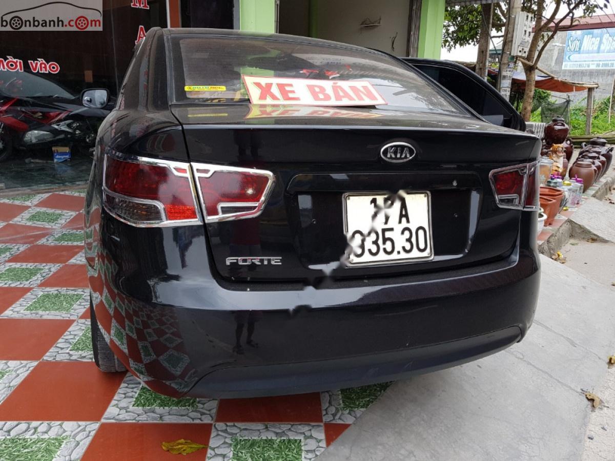 Kia Forte EX 1.6 MT 2010 - Bán Kia Forte EX 1.6 MT đời 2010, màu đen 