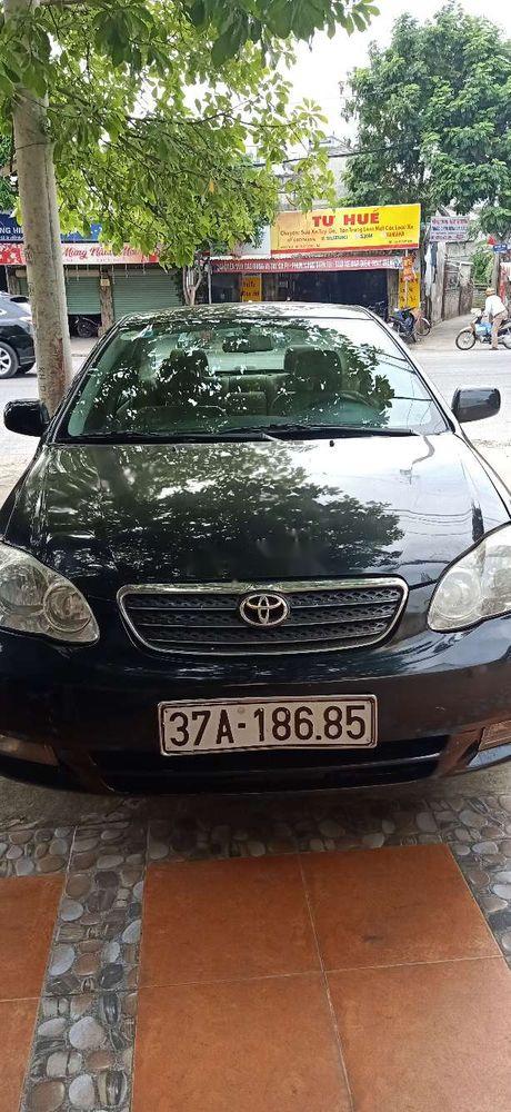 Toyota Corolla altis 2004 - Gia đình bán Toyota Corolla altis sản xuất năm 2004, màu đen