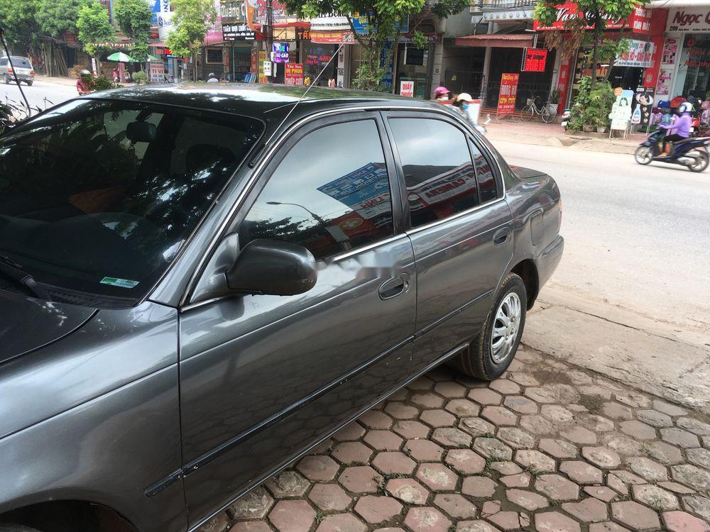 Toyota Corolla  1.6GLi  1995 - Bán Toyota Corolla 1.6GLi 1995, màu xám, xe nhập, 125tr