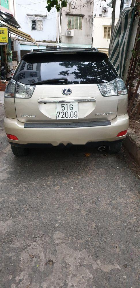 Lexus RX  400h  2006 - Bán Lexus RX 400h sản xuất năm 2006, màu vàng, xe nhập