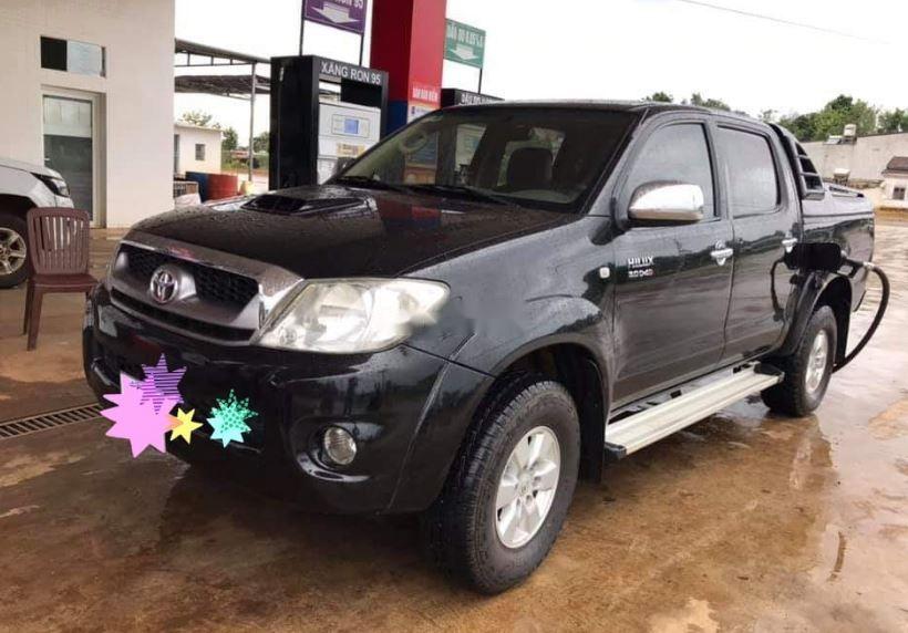 Toyota Hilux   2009 - Cần bán Toyota Hilux 2009, màu đen, giá 360tr