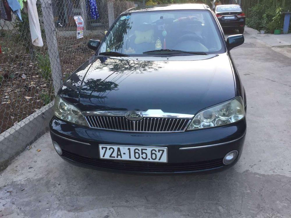 Ford Laser   2004 - Bán Ford Laser năm sản xuất 2004, màu đen, xe nhập  