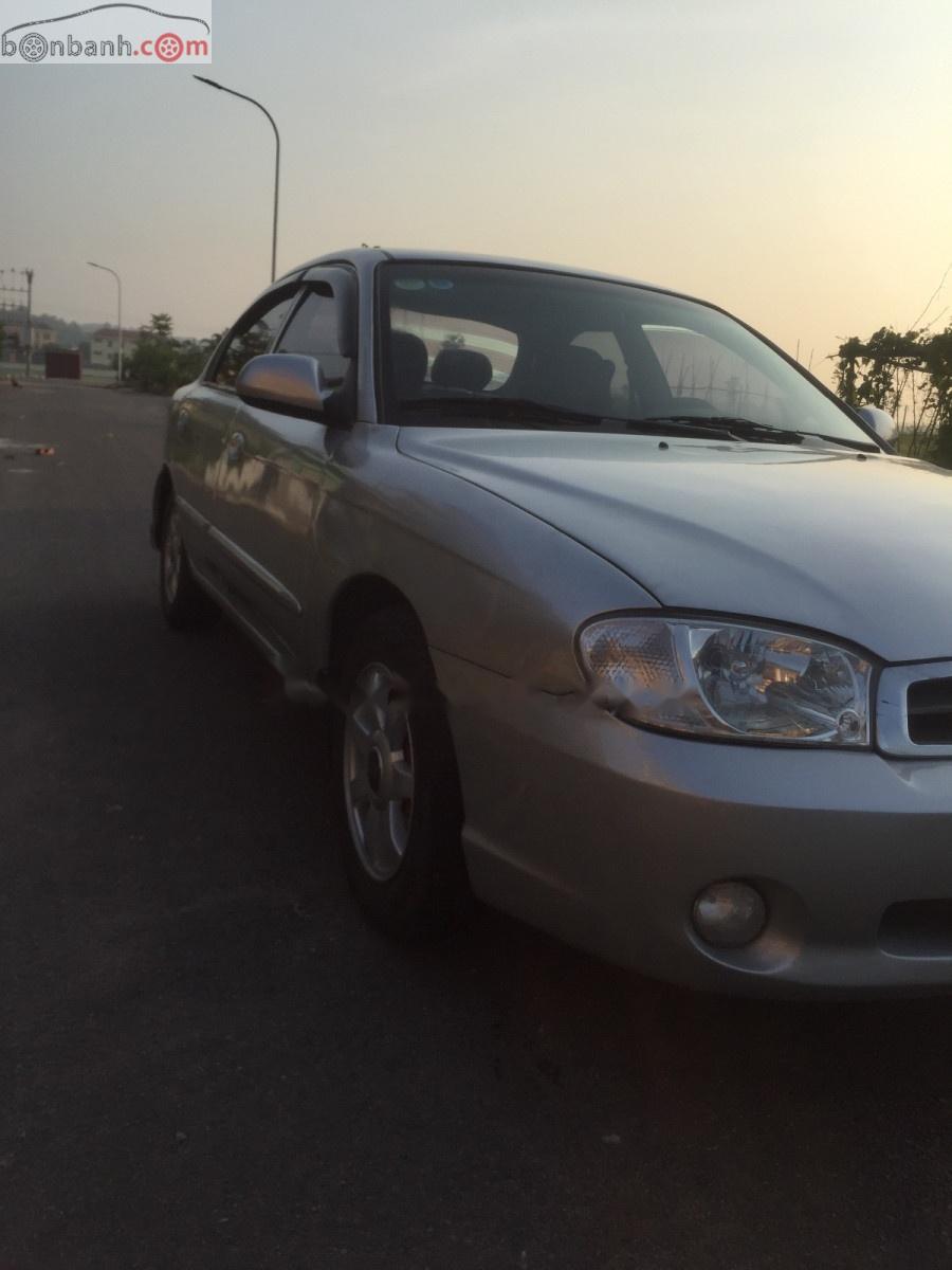 Kia Spectra AT 2003 - Bán xe Kia Spectra AT đời 2003, màu bạc