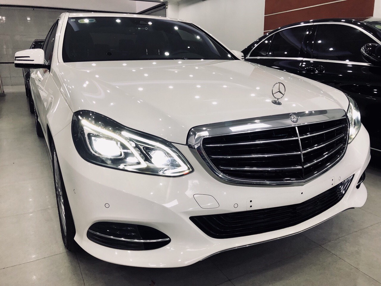 Mercedes-Benz E class E200 2013 - Bán Mercedes Benz E200 sản xuất 2013 xe đẹp đi đúng 49.000km, cam kết bao test hãng