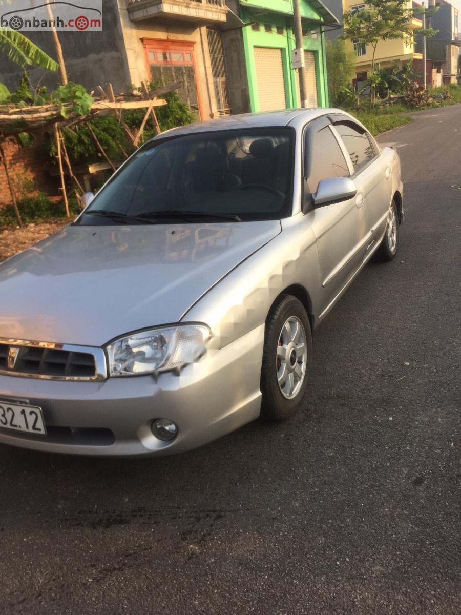 Kia Spectra AT 2003 - Bán xe Kia Spectra AT đời 2003, màu bạc