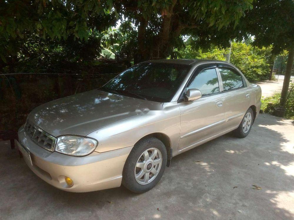 Kia Spectra 2005 - Bán xe Kia Spectra năm sản xuất 2005, màu vàng cát