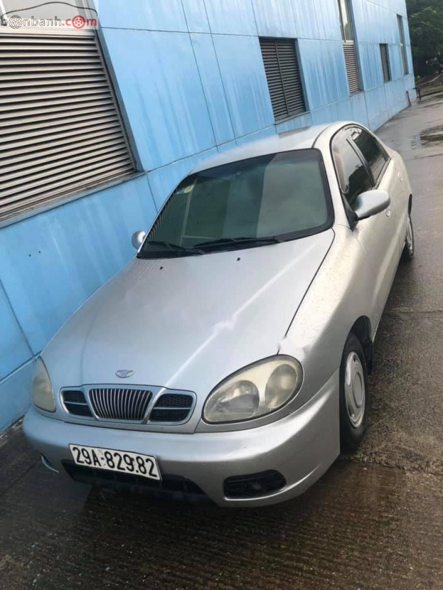 Daewoo Lanos 2003 - Cần bán gấp Daewoo Lanos sản xuất 2003, màu bạc