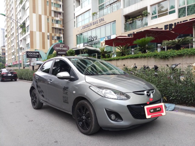 Mazda 2 2013 - Ô Tô Thủ Đô bán xe Mazda 2 1.5L sản xuất 2013 màu bạc, 335 triệu