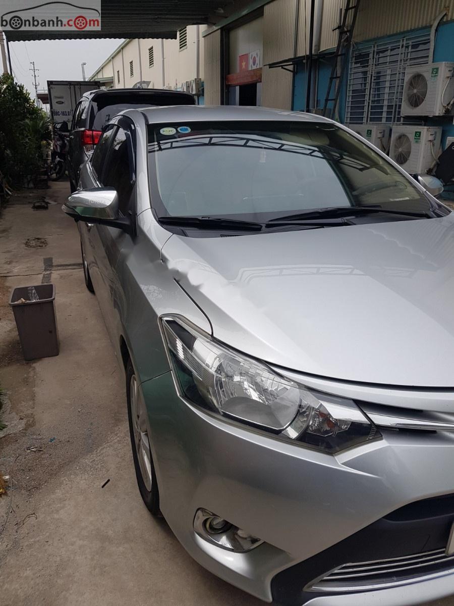 Toyota Vios 1.5E 2014 - Bán Toyota Vios 1.5E đời 2014, màu bạc, xe gia đình