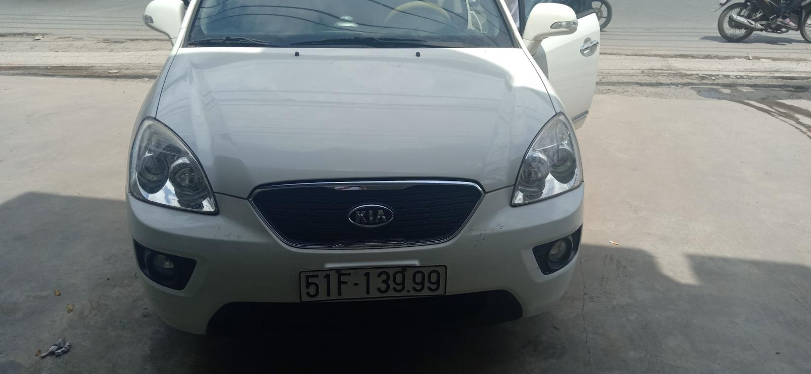 Kia Carens 2.0 2015 - Bán Kia Carens 2.0 đời 2015 bản S, số sàn, máy xăng, màu trắng, giá tốt