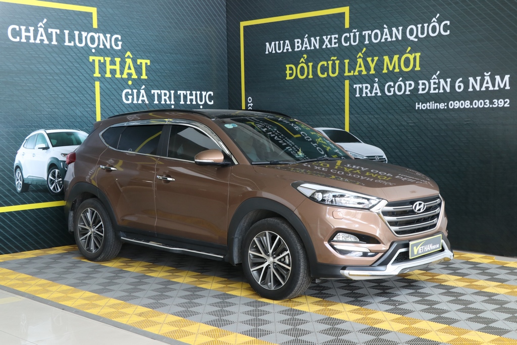 Hyundai Tucson 2.0AT 2WD 2015 - Bán ô tô Hyundai Tucson 2.0AT 2WD sản xuất 2015, màu nâu, xe nhập giá cạnh tranh