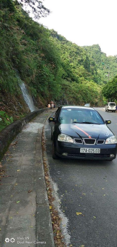 Daewoo Lacetti 2005 - Lên đời bán xe Daewoo Lacetti năm 2005, màu đen