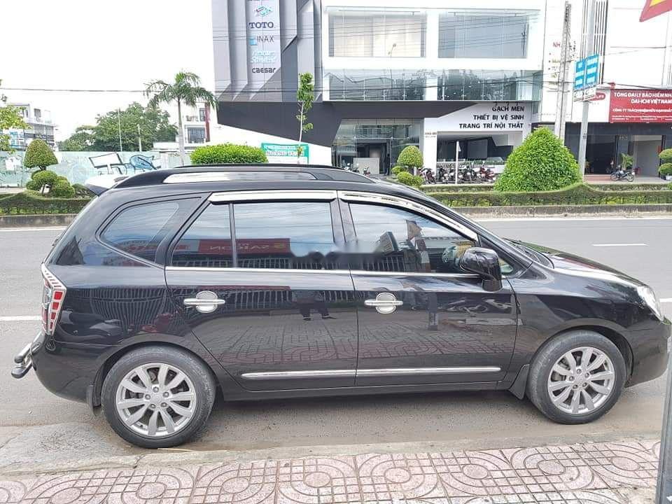 Kia Carens 2010 - Bán Kia Carens sản xuất 2010, màu đen số sàn  