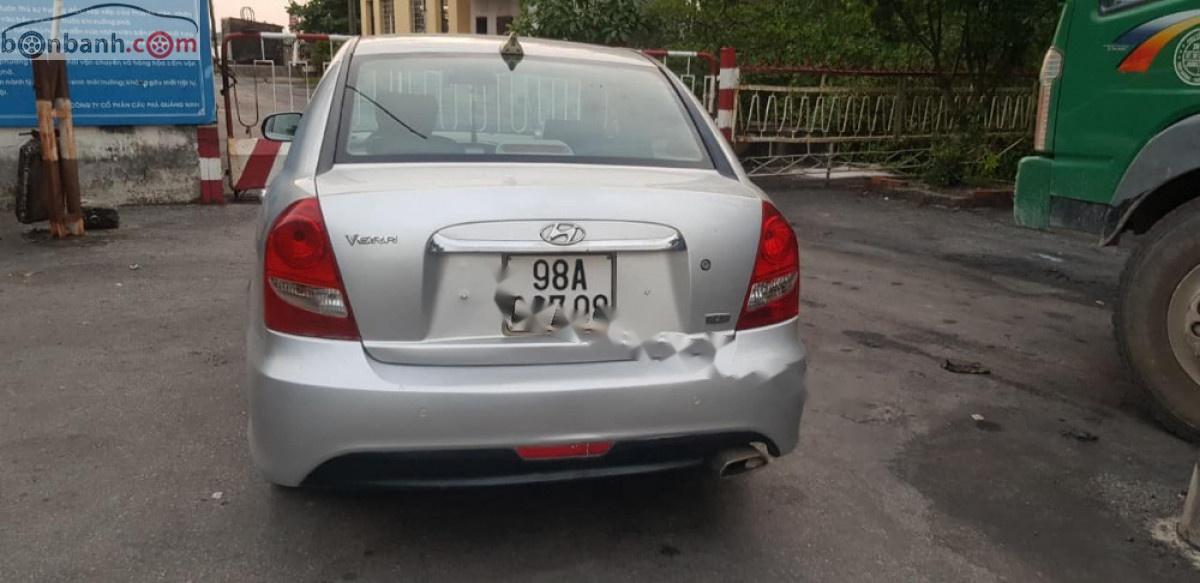 Hyundai Verna 1.4 AT 2009 - Bán Hyundai Verna 1.4 AT đời 2009, màu bạc, xe nhập