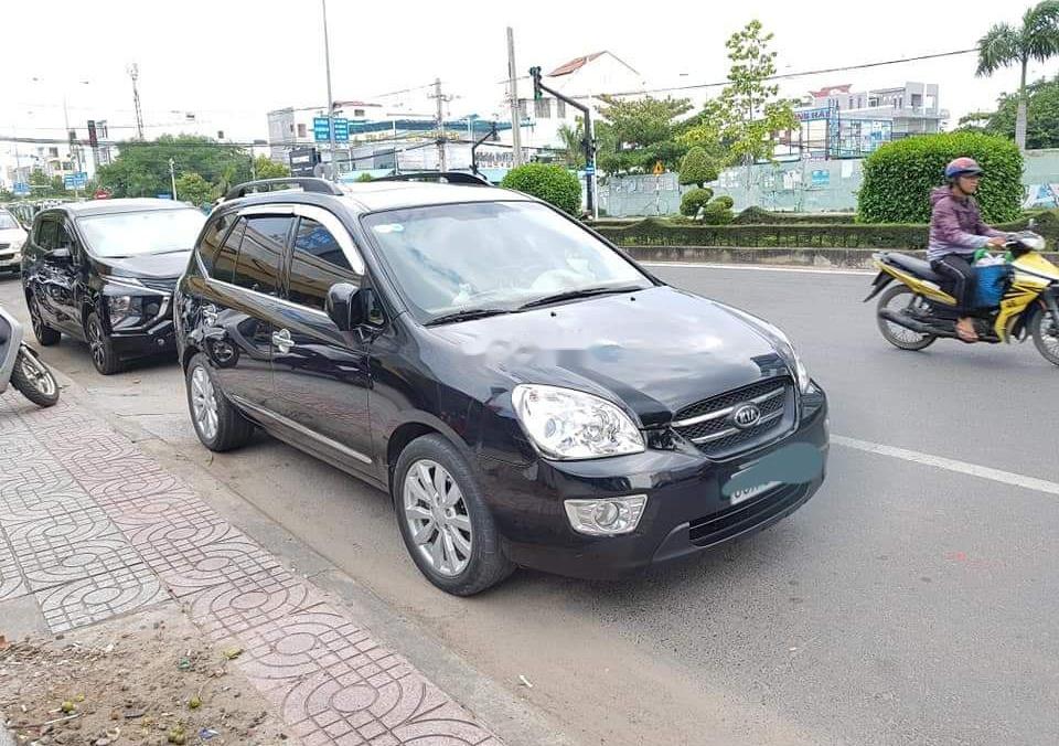 Kia Carens 2010 - Bán Kia Carens sản xuất 2010, màu đen số sàn  