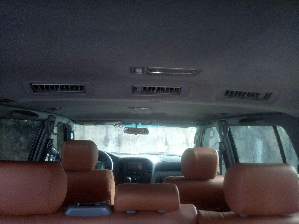 Toyota Land Cruiser   4500EFI 2002 - Bán Toyota Land Cruiser 4500EFI đời 2002, màu đen, số sàn, 2 cầu