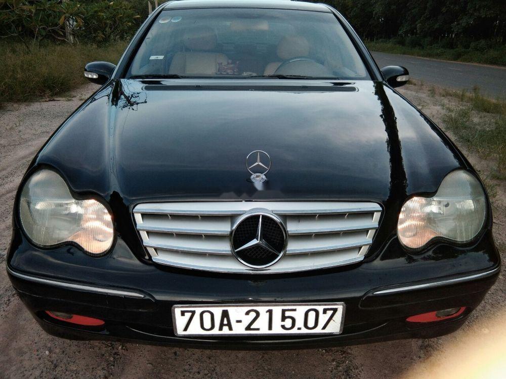 Mercedes-Benz C class  C200 2002 - Bán xe Mercedes C200 2002, màu đen, số sàn