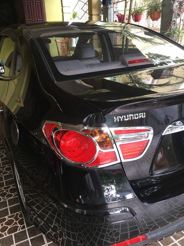 Hyundai Avante MT 2014 - Bán Hyundai Avante MT sản xuất năm 2014, màu đen như mới 