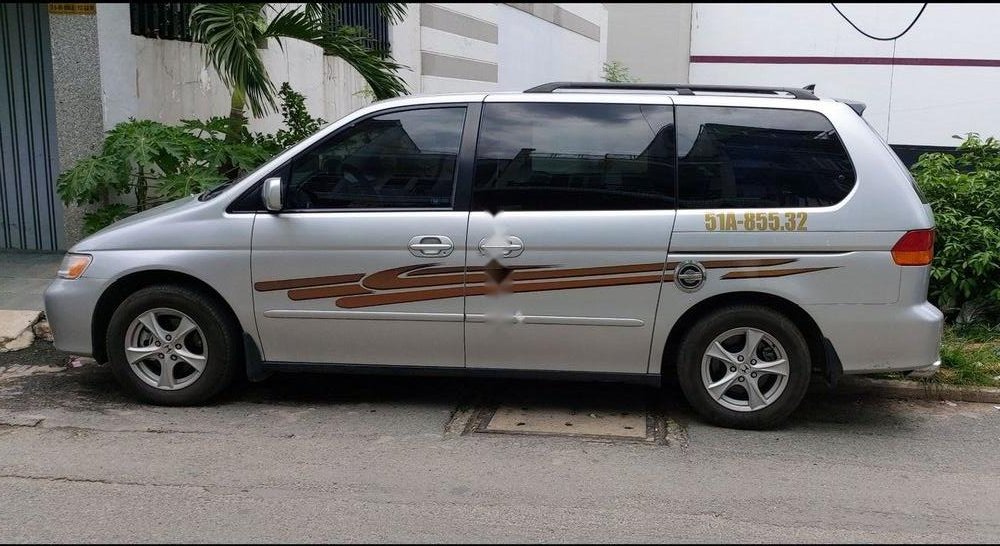 Honda Odyssey   2004 - Bán Honda Odyssey sản xuất năm 2004, màu bạc, xe nhập  