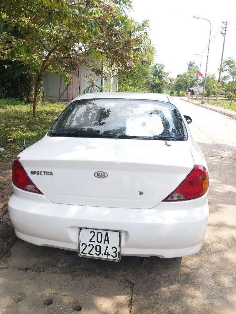 Kia Spectra 2004 - Nhà bán Kia Spectra năm 2004, màu trắng