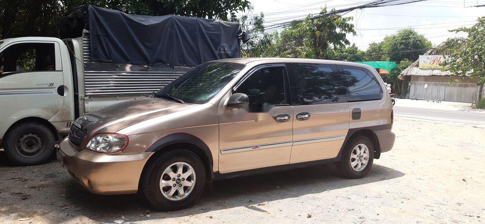 Kia Carnival   2009 - Bán xe cũ Kia Carnival 2009, màu nâu, 250tr