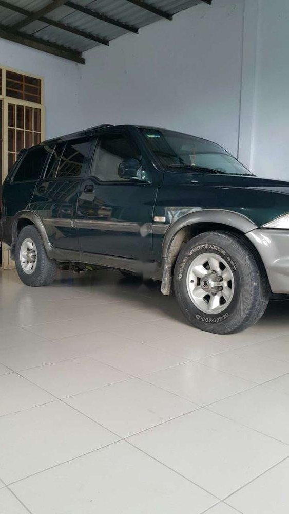 Ssangyong Musso 2004 - Chính chủ bán xe Ssangyong Musso sản xuất năm 2004, màu xanh lục