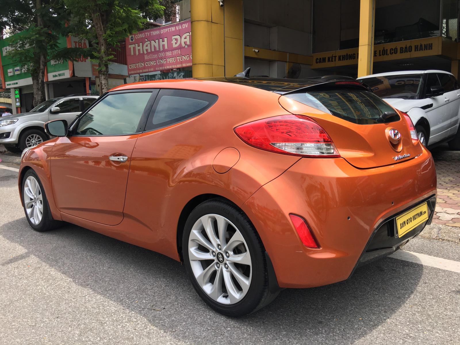 Hyundai Veloster   2011 - Bán ô tô Hyundai Veloster 1.6AT đời 2011, màu vàng, nhập khẩu nguyên chiếc, giá 475tr