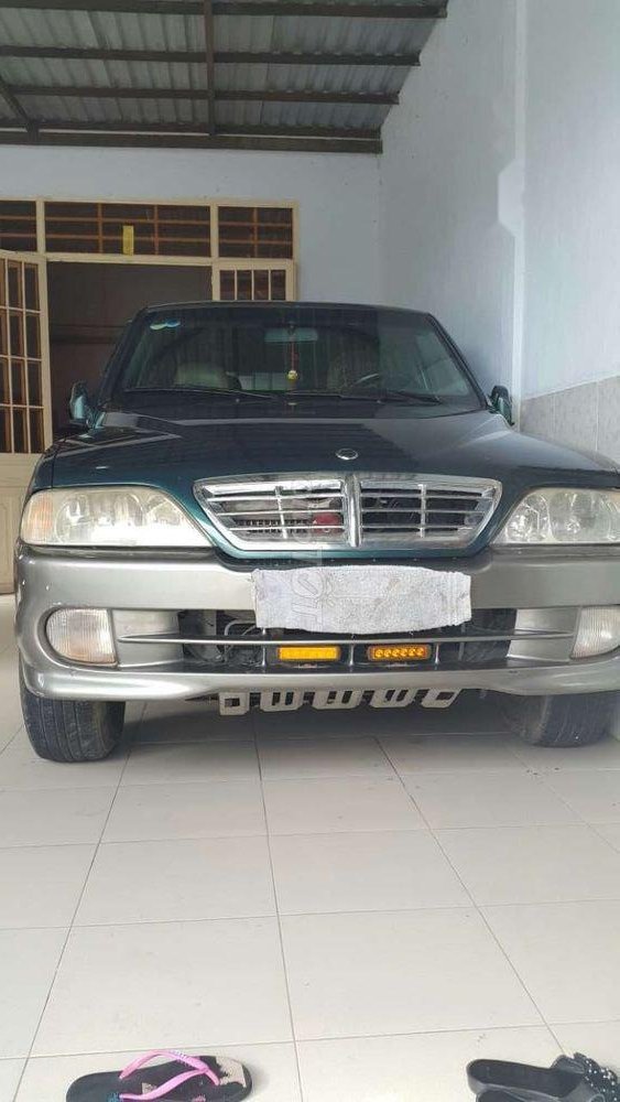 Ssangyong Musso 2004 - Chính chủ bán xe Ssangyong Musso sản xuất năm 2004, màu xanh lục