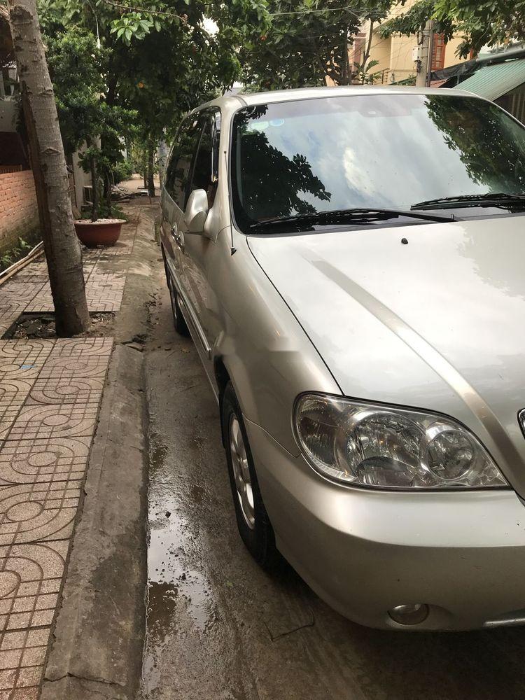 Kia Carnival 2009 - Bán Kia Carnival sản xuất năm 2009, màu vàng cát