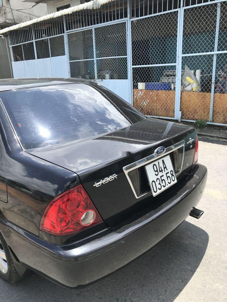 Ford Laser   2002 - Bán Ford Laser năm 2002, màu đen, xe nhập