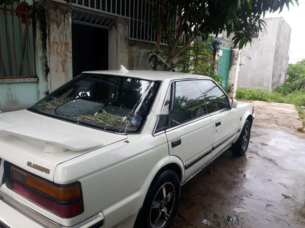 Nissan Bluebird 1986 - Bán xe Nissan Bluebird đời 1986, màu trắng, nhập khẩu, đăng kiểm đến 2020