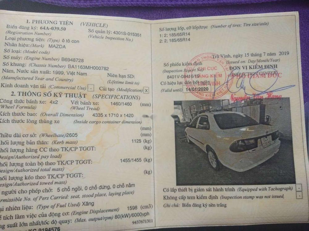 Mazda 323   1999 - Bán Mazda 323 1999, màu trắng, xe gia đình