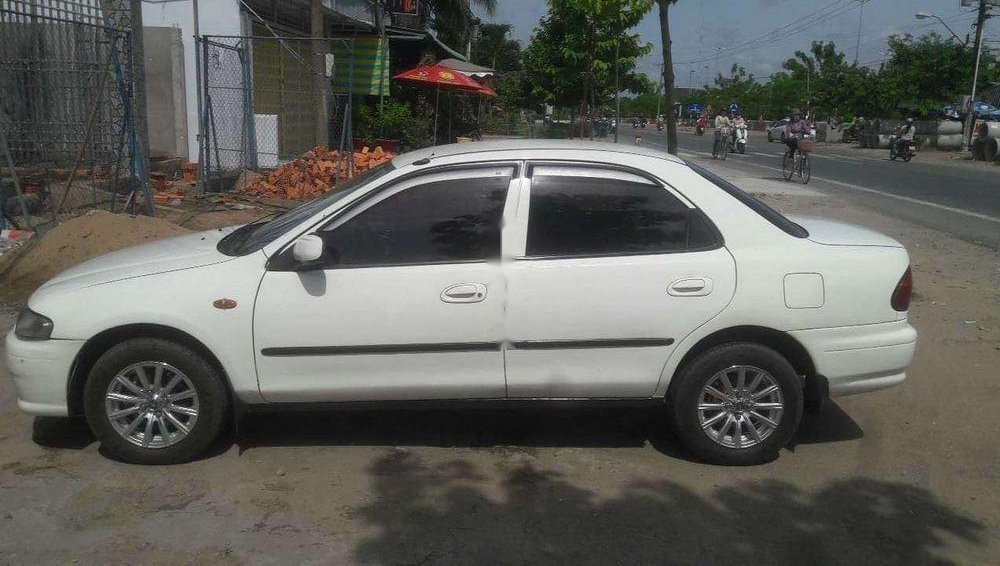 Mazda 323   1999 - Bán Mazda 323 1999, màu trắng, xe gia đình