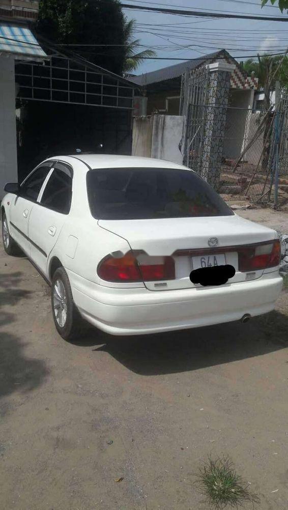 Mazda 323   1999 - Bán Mazda 323 1999, màu trắng, xe gia đình