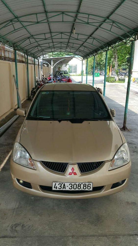 Mitsubishi Lancer 2004 - Cần bán lại xe Mitsubishi Lancer đời 2004, màu vàng xe gia đình, giá chỉ 230 triệu