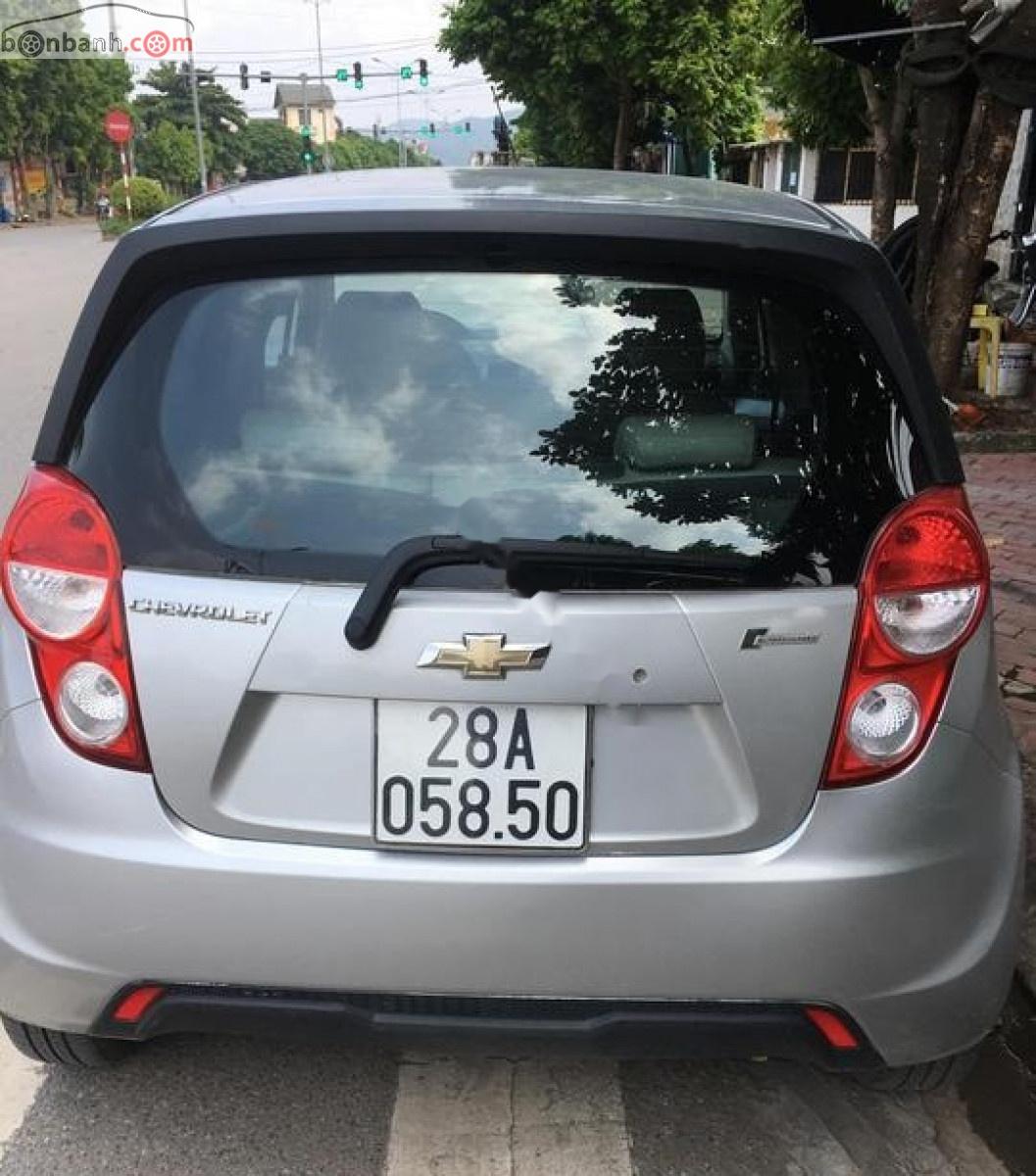 Chevrolet Spark LS 1.0 MT 2015 - Chính chủ bán xe Chevrolet Spark LS 1.0 MT đời 2015, màu bạc